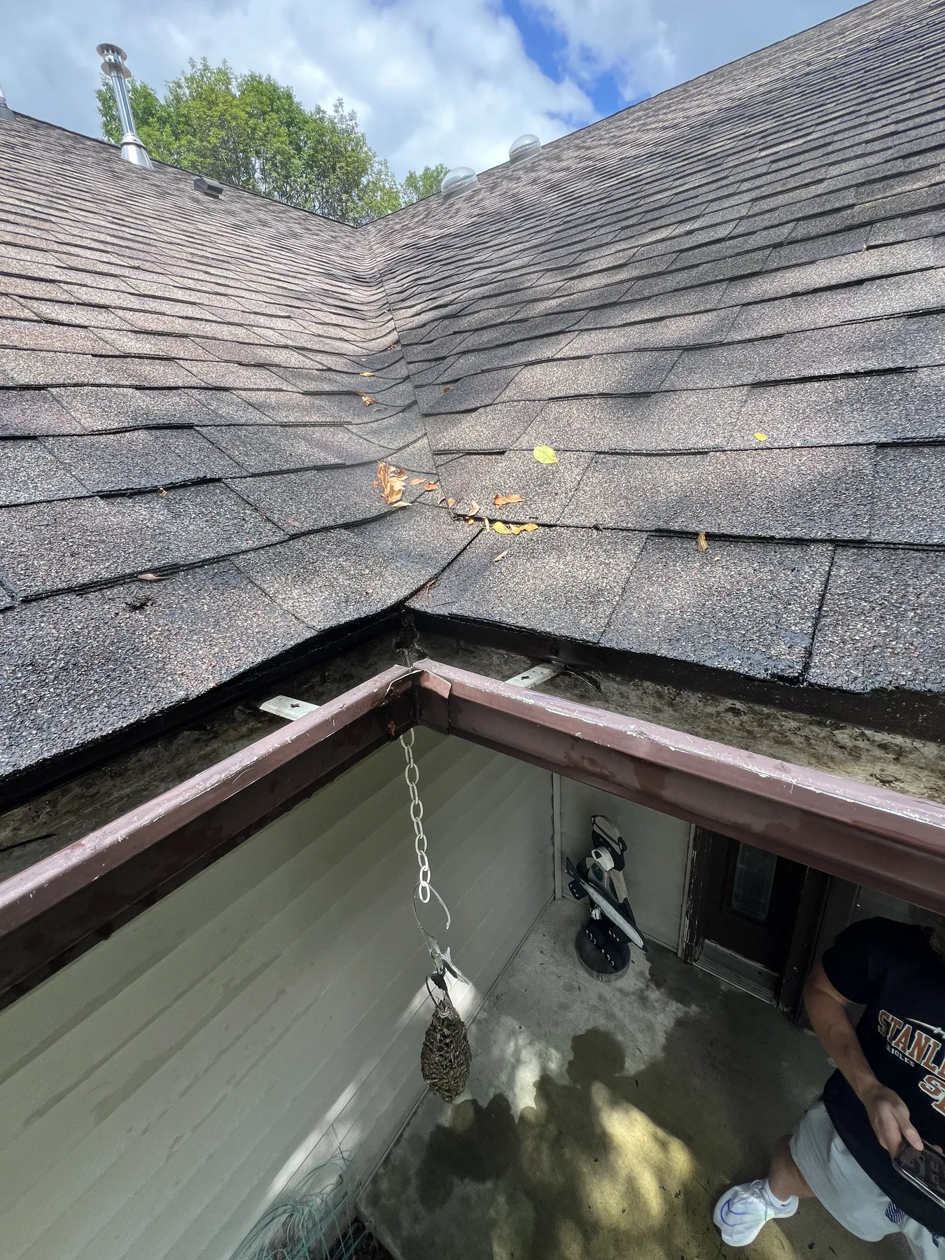 Clean gutter and roof valley after Majestic Shine removed leaves and organic debris